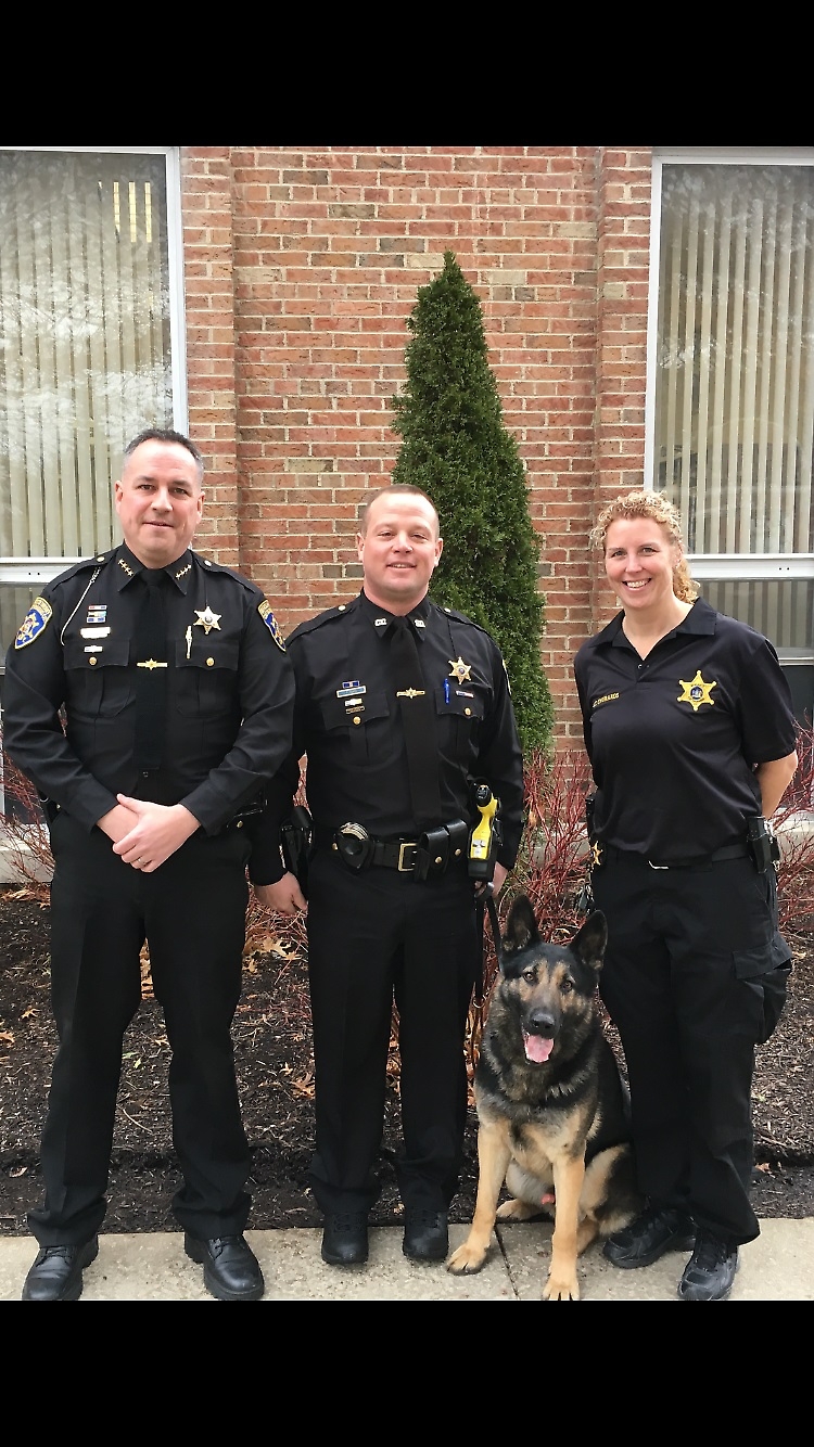 Sheriff Timothy Whitcomb, Deputy Tim Pence, K-9 Nichols and Lieutenant Melanie Churakos, the supervisor of the canine position.